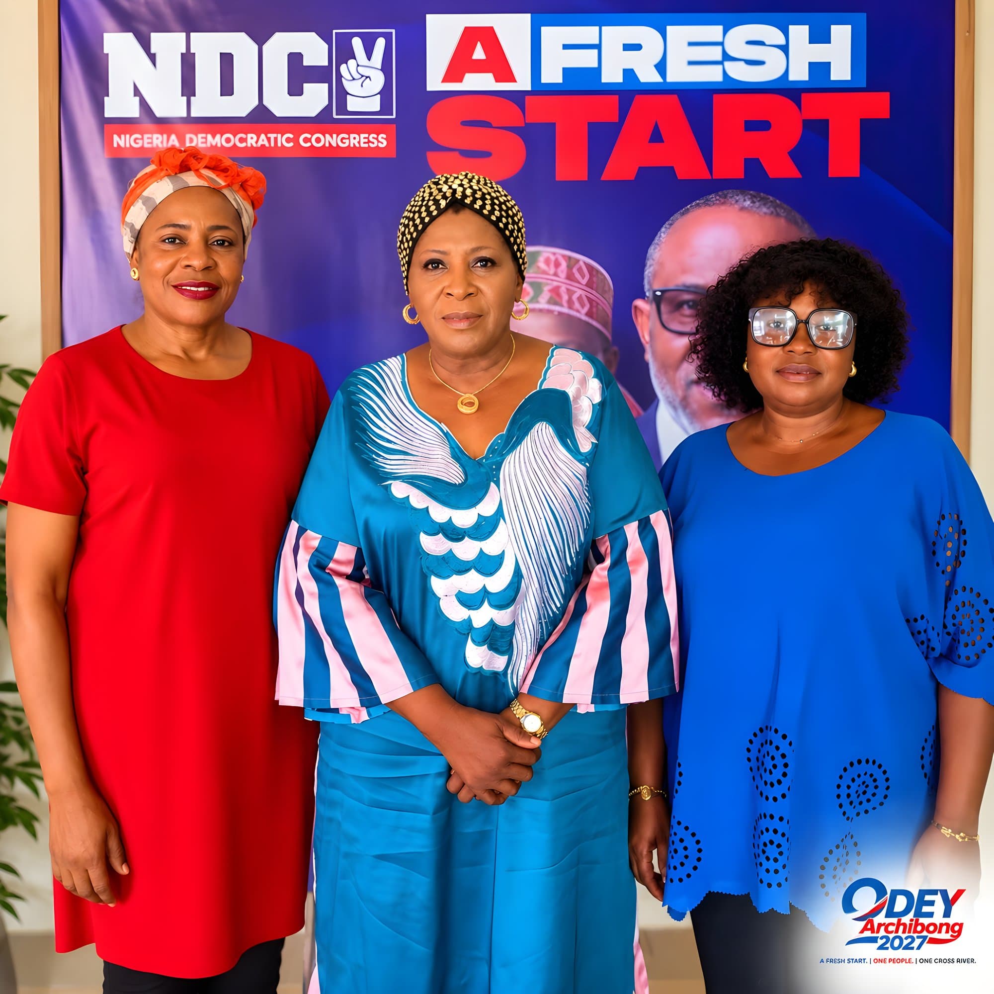 Woman Leader of the Non-Indigenous Community and her Assistant identify with the NDC at the Southern Senatorial District chapter chairmen meeting.