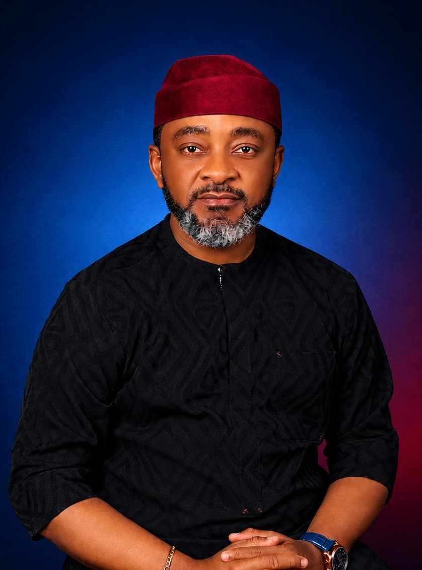 John Upan Odey Jnr in traditional attire, facing camera